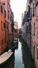 Image showing Gondolier in the small canals of Venice, Italy