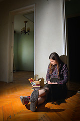 Image showing Young girl in black vintage dress 