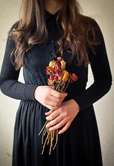 Image showing Young girl in black vintage dress 