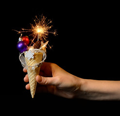 Image showing Ice cream cone and christmas decoration