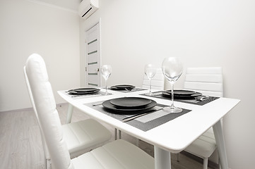 Image showing minimalistic served white table