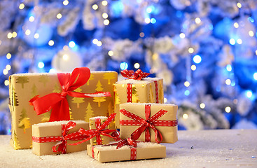 Image showing Christmas gifts on table 