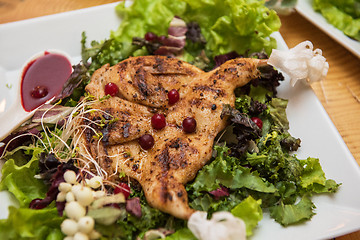 Image showing quail roasted with sweet and sour cranberry sauce