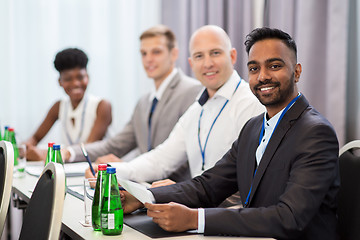 Image showing happy business team at international conference