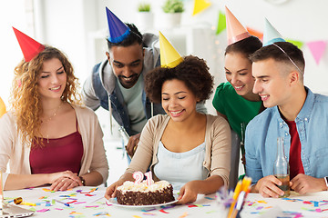 Image showing team greeting colleague at office birthday party