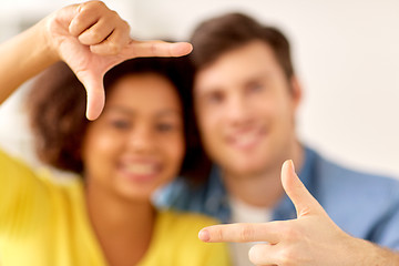 Image showing happy couple hands making frame gesture