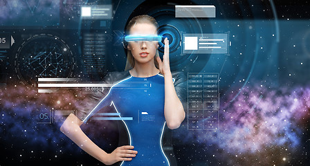 Image showing woman in virtual reality 3d glasses with charts