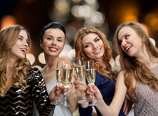 Image showing happy women drinking champagne at christmas