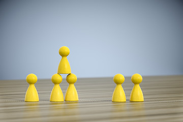 Image showing game figures building a pyramid