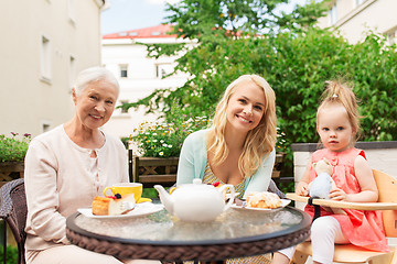 Image showing mother, grandmother and granddaughter at cafe