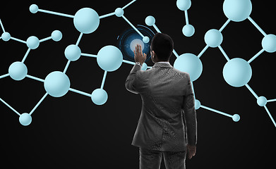 Image showing businessman working with molecule formula