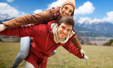 Image showing happy young couple having fun over alps mountains