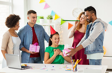 Image showing team greeting colleague at office birthday party