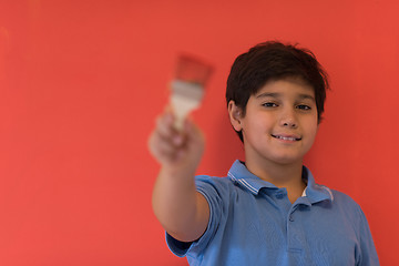 Image showing Portrait of a happy young boy painter