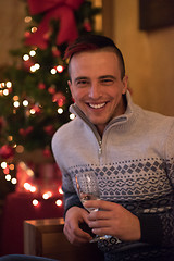 Image showing Happy young man with a glass of champagne