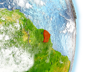Image showing French Guiana in red on Earth