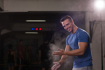 Image showing Gym Chalk Magnesium Carbonate hands clapping man