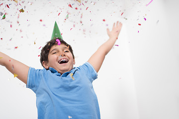 Image showing kid blowing confetti