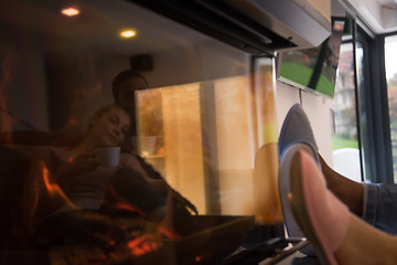 Image showing Young multiethnic couple  in front of fireplace