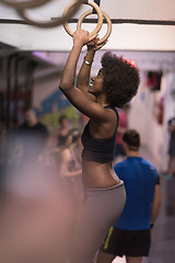 Image showing black woman doing dipping exercise