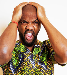 Image showing portrait of young handsome african man wearing bright green nati