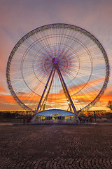 Image showing Place de la Concorde at sunset. Ferris wheel and Egyptian obelis