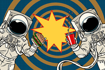 Image showing Two astronauts are eating lunch fast food