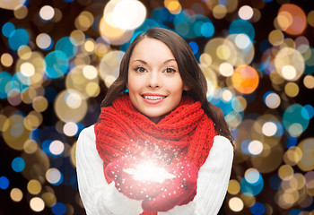 Image showing woman in scarf with christmas magic snowflake