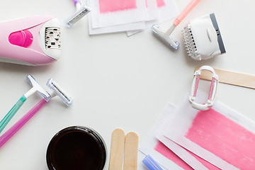 Image showing hair removal wax, epilator and safety razor