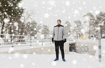 Image showing sports man in winter outdoors