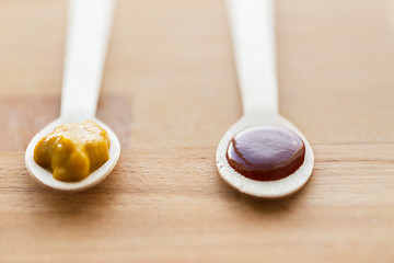 Image showing vegetable or fruit puree or baby food in spoons