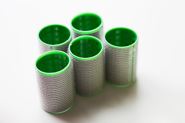 Image showing green hair curlers or rollers