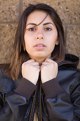 Image showing Beautiful Meloncholy Mixed Race Young Woman Portrait Outside.