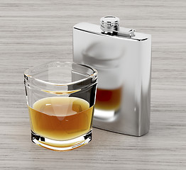 Image showing Hip flask and a glass of brandy