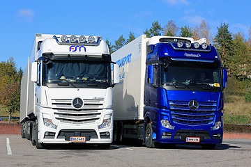 Image showing White and Blue Mercedes-Benz Actros Trucks