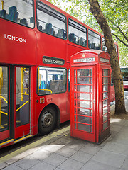 Image showing a red bus and typical phone box of London