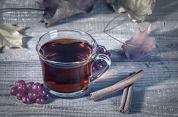 Image showing Cup of tea with viburnum and cinnamon