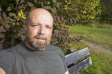 Image showing man having a rest outdoors