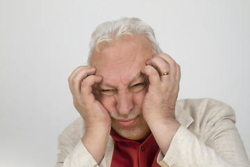 Image showing Senior man with strong headache