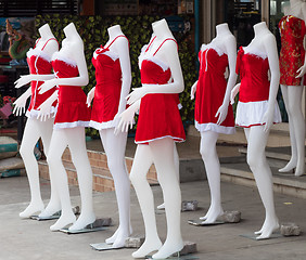 Image showing Santa Claus costumes for bar hostesses