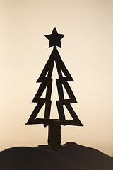 Image showing Driftwood Christmas tree silhouette sunrise