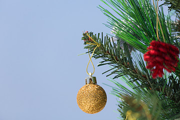 Image showing Christmas tree decorated with baubles closeup