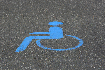 Image showing Handicapped parking icon on asphalt