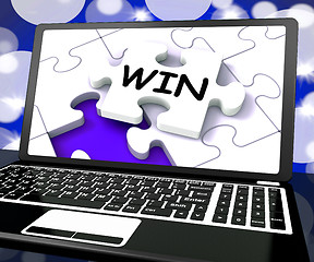 Image showing Win Puzzle On Laptop Shows Victory