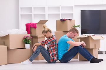 Image showing young couple moving  in new house