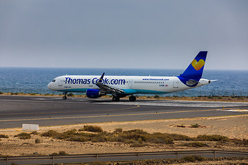 Image showing ARECIFE, SPAIN - APRIL, 16 2017: AirBus A321 of ThomasCook.com w