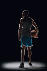 Image showing The portrait of a basketball player with ball