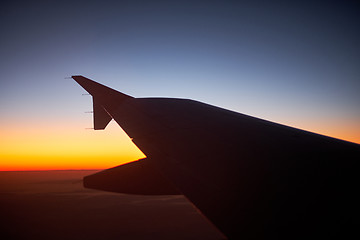 Image showing sunset from the airplane window