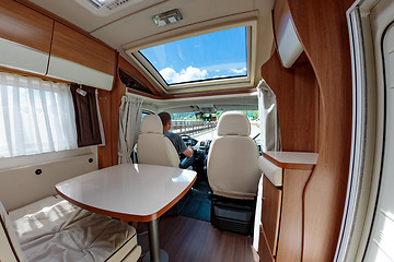 Image showing Man driving on a road in the Camper Van RV