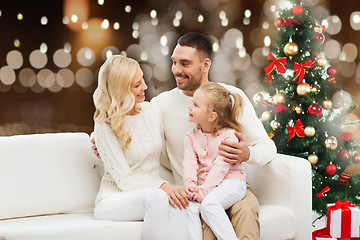 Image showing happy family at home with christmas tree